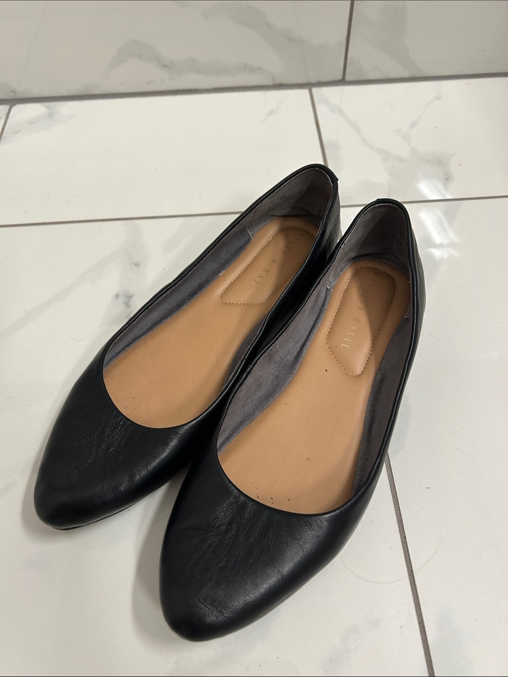 Kelly and Katie black leather flat